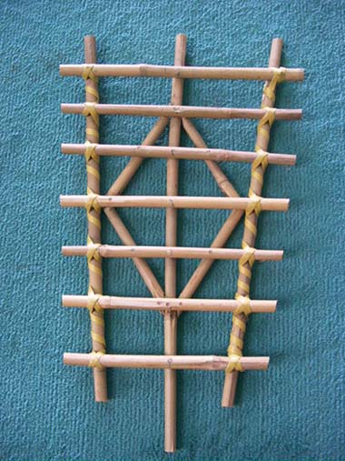 bamboo ladder with webbin...